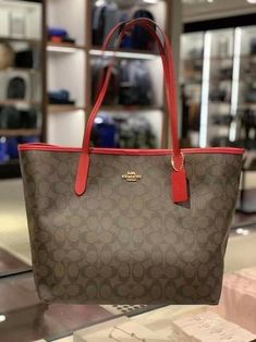 New Coach 5696 City Tote Bag in Signature Coated Canvas, Brown Red $350 NWT. Red Coach Bag For Everyday, Coach Tote Bag Outfit, Red Coach Purse, Brown Coach Tote Bag, Tiffany's Jewelry, Addias Outfits, Coach City Tote, Coach Burgundy Shopping Bags, Red Coach Bag With Double Handle