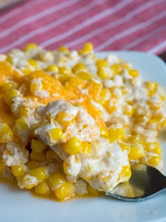 a white plate topped with macaroni and cheese