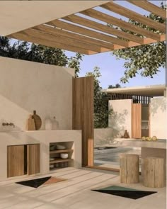 an outdoor kitchen is shown with wood accents