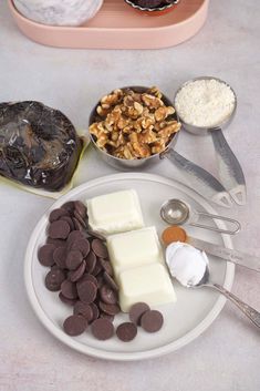 chocolates, marshmallows, and other ingredients on a plate