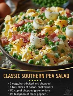 a bowl filled with eggs and peas on top of a table