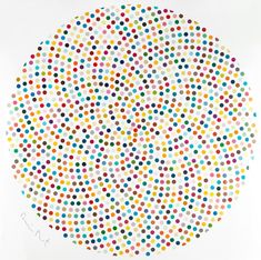 a white circle with multicolored dots on it, in front of a white background