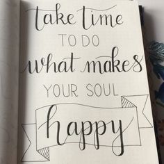 an open notebook with the words take time to do what makes your soul happy