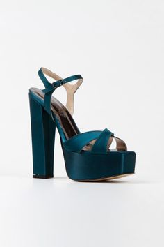 a woman's blue high heeled sandal