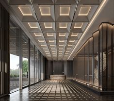 an empty room with lots of glass doors and lights on the ceiling is lit by recessed lighting