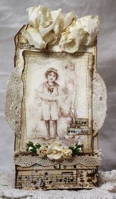 an altered photo frame with flowers on it