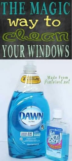 a bottle of dawn liquid next to a sign that says the magic way to wash your windows