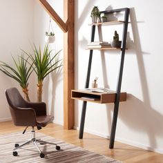 an office chair sits in front of a shelf with books and plants on it next to a potted plant