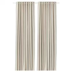 two white curtains with black piping on the top and bottom, one is closed