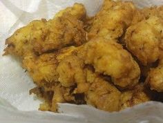 some fried food is in a paper bag