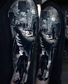 a man's arm with an image of two people on the street and one is holding