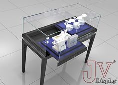 a glass table with some items on it and the words j v display above it