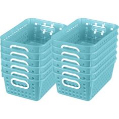 two blue plastic baskets sitting next to each other