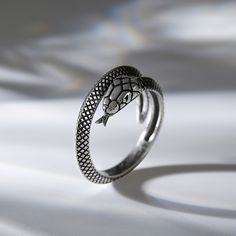 Snakes have always played an integral role in religion, mythology, and literature. The snake ring, in polished sterling silver, calls on the inner wisdom of its wearer; reminding them with each new day, they have the opportunity to rebirth into the best versions of ourselves.Material: Plating Color: Silver Silver Snake-shaped Ring For Formal Occasions, Silver Snake Ring For Formal Occasions, Silver Symbolic Snake Shaped Ring, Silver Symbolic Snake Ring, Ring Man, Sterling Silver Mens Rings, Inner Wisdom, Snake Ring, Mens Silver Rings