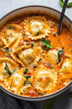 Creamy Ravioli Soup Ravioli In A Tomato Parmesan Broth, Creamy Tuscan Ravioli Soup, Creamy One Pot Ravioli Soup, Ravioli With Sausage And Spinach, Soup With Cheese Ravioli, Dutch Oven Ravioli, Creamy Ravioli Soup Recipe, Low Sodium Ravioli, Slow Cooker Ravioli Soup