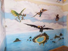 this is a mural in a child's room with dragon artwork on the wall