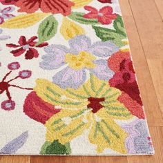 an area rug with flowers on it