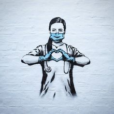 a stencil drawing of a nurse making a heart with her hands and wearing a face mask