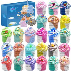 an assortment of cupcakes in different colors and flavors are displayed next to a blue box