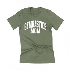 All Little Mama shirts are unisex sizing. They run slightly larger than typical women's shirts and slightly smaller than typical men's shirts. We recommend ordering your normal size for a regular fit.Please reference all size charts before purchasing.The default design color on this shirt is white, unless an option is given. Athleisure Cotton T-shirt With Team Name, Basic Cotton Sports Shirt, Cotton Gym Tops With Text Print, Sporty Green Shirt With Letter Print, Sporty Relaxed Fit Shirt For College, Graphic Print Cotton Workout Shirt, Casual Gym Shirt With Graphic Print, Unisex Pre-shrunk Sporty T-shirt, Pre-shrunk Cotton Sports Shirt