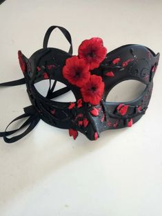 Red Mascurade Mask, Face Masks With Flowers, Luxury Red Mask For Masquerade, Cheap Themed Masks For Cosplay, Cheap Themed Costume Masks, Luxury Red Party Masks, Luxury Red Masks And Prosthetics For Masquerade, Half Mask Design Masquerade Ball, Luxury Red Masquerade Mask For Party