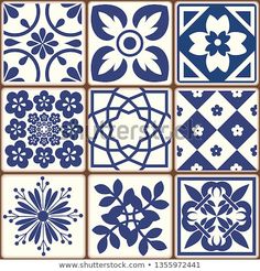 blue and white tiles with flower designs on them, all in different shapes and sizes