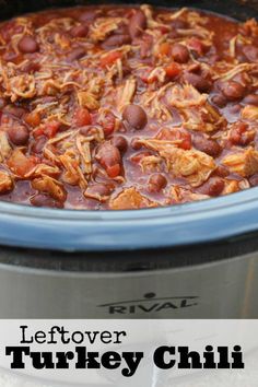 a crock pot filled with leftover turkey chili