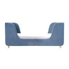 a blue couch with a white pillow on it