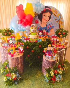 a snow princess themed birthday party with balloons and decorations