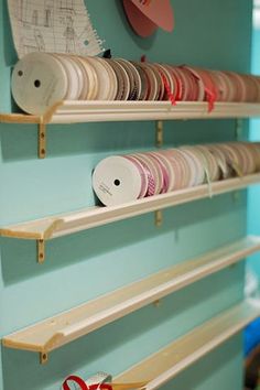 the shelves are filled with hats and other items