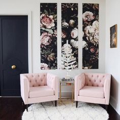 two pink chairs sitting next to each other on top of a white carpeted floor