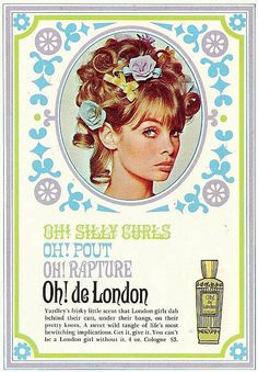 an advertisement for old london perfumes with a woman's face and flowers in her hair