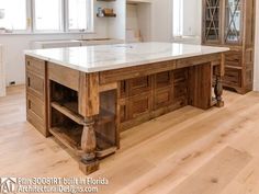 a large kitchen island in the middle of a room