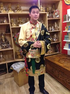 A friend from Taiwan appreciating Tibetan Traditonal chupa Tibetan Chupa Designs, Tibetan Chupa Pattern, Tibetan Clothes Traditional Dresses, Tibetan Chupa, Tibetan Yonchap, Tibetan Clothes Men, Tibetan Buddhist Clothing, Chupa Tibetan Dress, Tibetan Mens Clothing