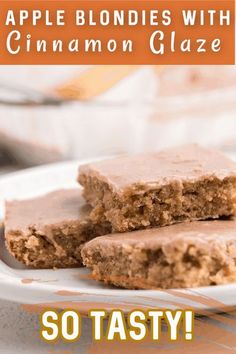 two pieces of apple blondies with cinnamon glaze are on a plate and the text reads, so tasty