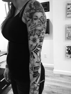 a woman with a tattoo on her arm