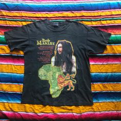 Vintage Bob Marley Redemption song 90s t-shirt Size: L (21.5x27.5) Tag: allsport Year: 1998 Condition: 8/10 slightly fade Worldwide shipping Shipping and Handling Ship by Thailand Post with Tracking number. = Import duties, taxes and charges are not included in the item price or shipping charges. These charges are the buyer's responsibility. = These charges are normally collected by the delivering freight (shipping) company or when you pick the item up ? do not confuse them for additional shipping charges. = International orders can take as little as a week and as long as 6 weeks for delivery. Delays are often at your customs office. = Express shipping (FEDEX/DHL/UPS) take 5-7 days please contact me. DELIVERY TIME: Thailand post USA: 7-14 business days  UK and Europe Country: 7-14 business Bob Marley Fashion Style, Bob Marley Shirt Outfit, Bob Marley Sweater, Vintage Bob Marley, Bob Marley Tshirt, Bob Marley T Shirt, Bob Marley Shirt, Bob Marley Shirts, Vintage Bob