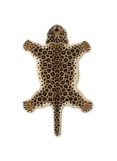 an animal shaped rug with leopard spots on it