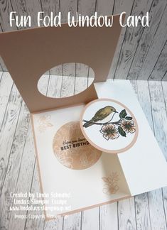 an open card with a bird on it and the words fun fold window card written below