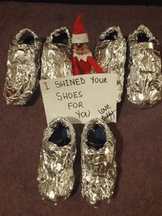 there is a sign that says i shined your shoes for you with tinfoil