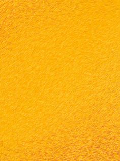 an orange and yellow textured background that looks like it has been painted with acrylic paint