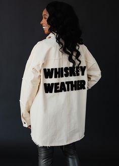 The little bit of edge your wardrobe needs. Our new ivory oversized distressed jacket with black "Whiskey Weather" lettering on the back is a fun piece to add to your fall and winter wardrobes! Ivory distressed lightweight jacket Black textured "Whiskey Weather" letters on the back  Two pockets on the front at the bust Snap closure on the front Oversized fit Designed in the U.S.A. Produced in China.  Model is wearing a size small 100% Cotton SIZE CHART S: Bust: 42" / Length: 26.5" M: Bust: 44" / Black Whiskey, Knitted Hats Kids, Knit Hat For Men, Distressed Jacket, Wardrobe Needs, Blouse Tank Top, Closet Goals, Black Rock, Oversized Jacket