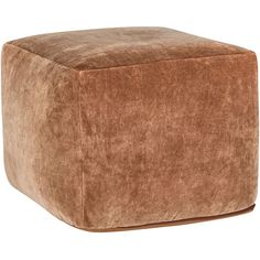 a brown square ottoman sitting on top of a white floor