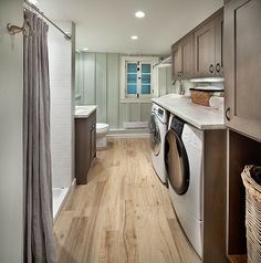 a washer and dryer in a small room