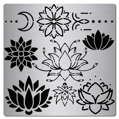 a metal plate with black and white flowers on it