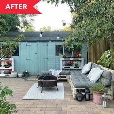 an outdoor living area with couches and potted plants