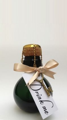 a wine bottle with a cork top and tag attached to it