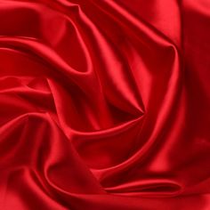 Our red stretch charmeuse fabric is the perfect choice for creating beautiful, long-lasting wedding gowns, bridal dresses and other special occasion garments. With an exquisite drape and a two-way stretch of 96% polyester and 4% spandex, this 60-inch wide fabric is perfect for giving your garments a luxurious and flowy look. Its vibrant red color and superior quality will make you want more. Buy it today and create the perfect dress for your special occasion! Please note that while we strive to Red Silk Fabric, Velvet Evening Gown, Rayon Crinkle, Charmeuse Fabric, Silk Wallpaper, Silk Satin Fabric, True Red, Silk Charmeuse, Red Aesthetic