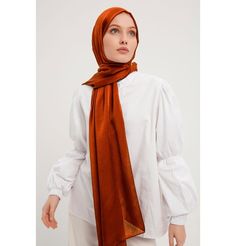 Shine Hijab Shawl - Cinnamon Glossy in texture and elegant in appearance, our shine shawl is set to be the next great addition to your wardrobe! Its sleek shine makes for an impressive final touch to formal wear so you could look and feel your best on any special occasion. FEATURES: - Glossy finish - Suitable for all seasons - Opaque (not transparent) MATERIAL: - 75 cm x 185 cm - Polyester CARE: - Hand wash separately in cold water. - Lay flat to dry. - Iron on low without steam. Made in Turkey Elegant Shawl For Eid And Formal Occasions, Elegant Shawl For Formal Eid Occasions, Elegant Formal Shawl For Eid, Elegant Pashmina Shawl For Eid, Elegant Eid Pashmina Shawl, Elegant Brown Hijab, Elegant Solid Color Shawl For Fall, Lydia Elise Millen, Transparent Material