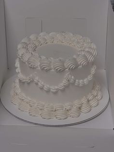 a three layer white cake in a box